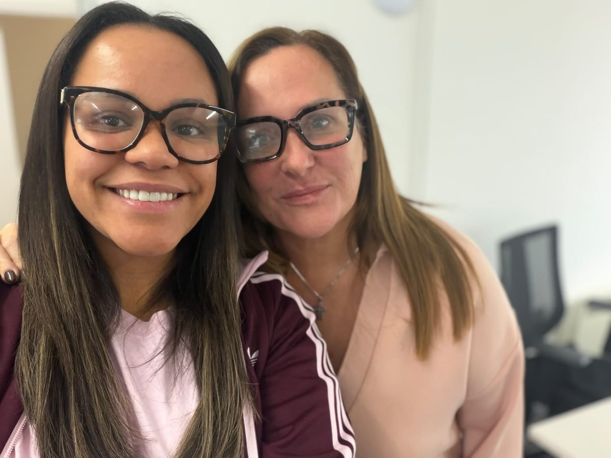 Two FT Recruitment colleagues in pink taking a selfie